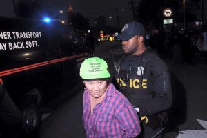 Amy Mei Willis is arrested while Legal Observing in Atlanta, GA. (Photo: Megan Harrison)